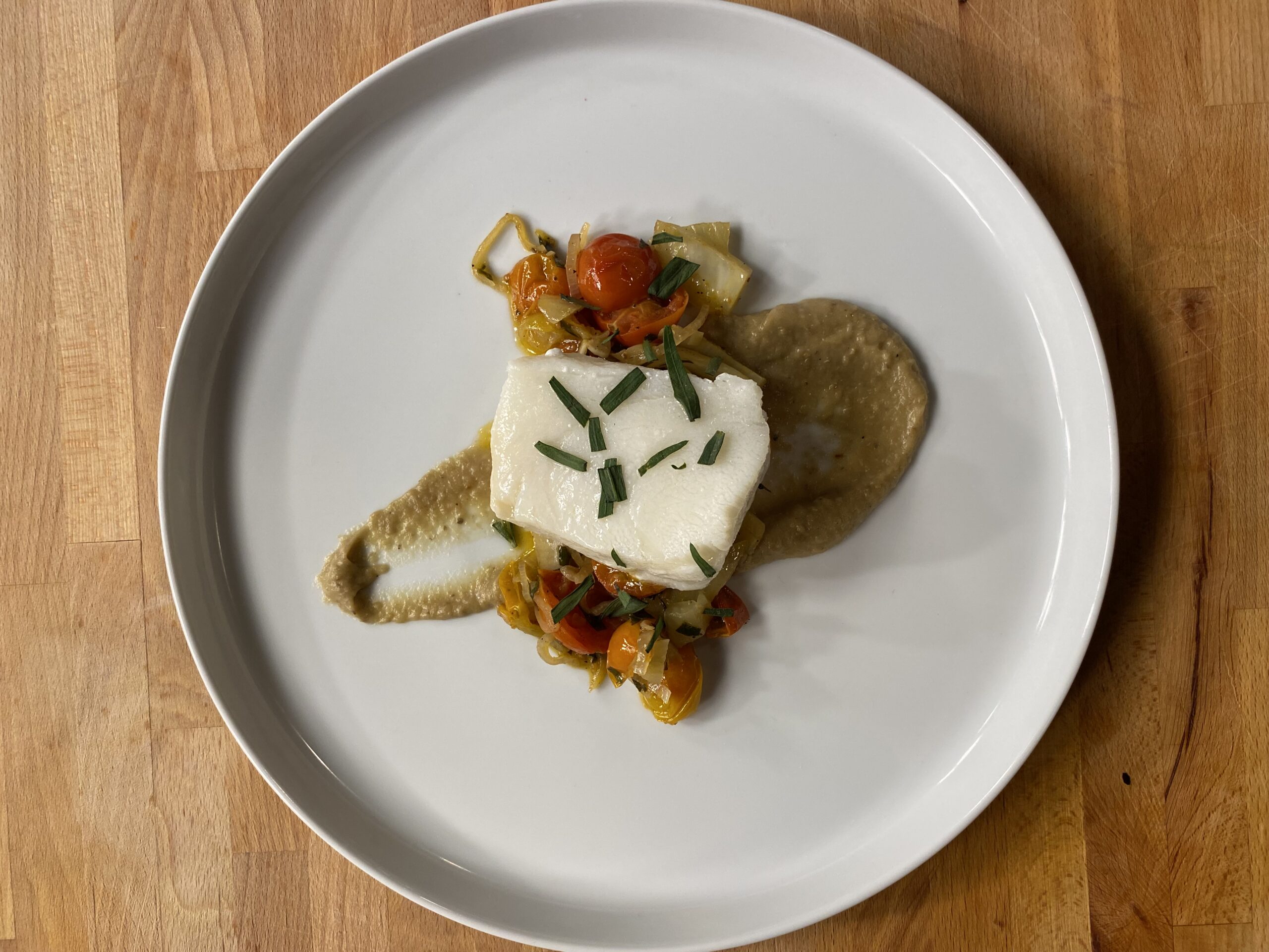 Poached Chilean Sea Bass with Stewed Tomato & Fennel