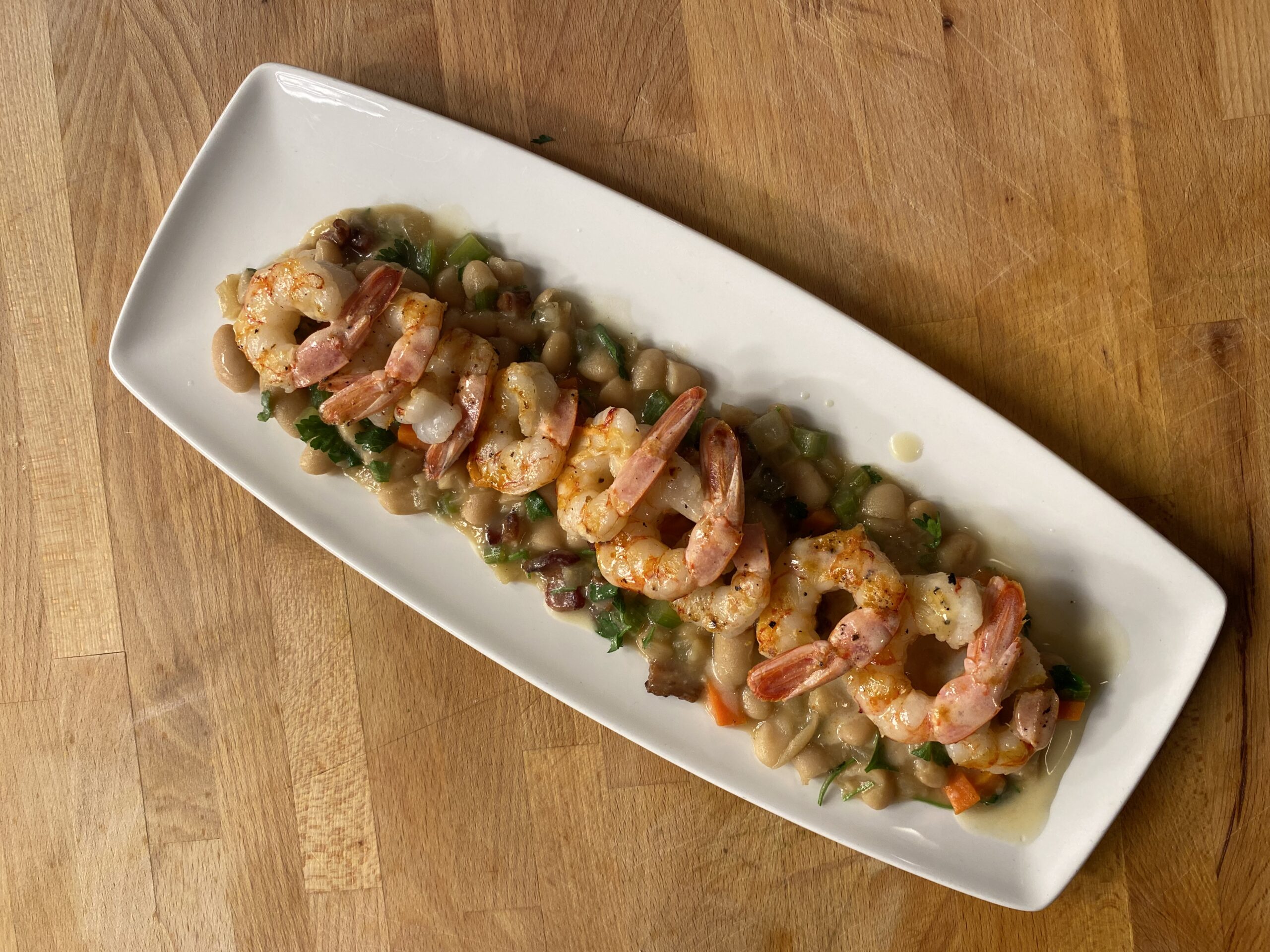 Grilled Argentine Red Shrimp With Charred Lemon Vinaigrette & Stewed White Beans